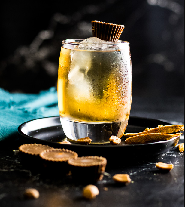Peanut butter whiskey and Coke with Reese's garnish
